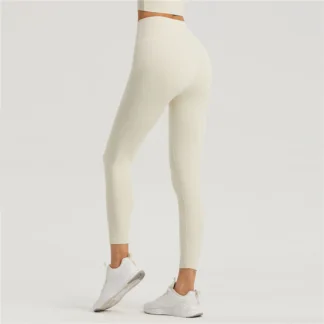 Lycra naked sense anti-roll edge high waist pocket yoga pants without T-line peach hip and belly sports tights beige